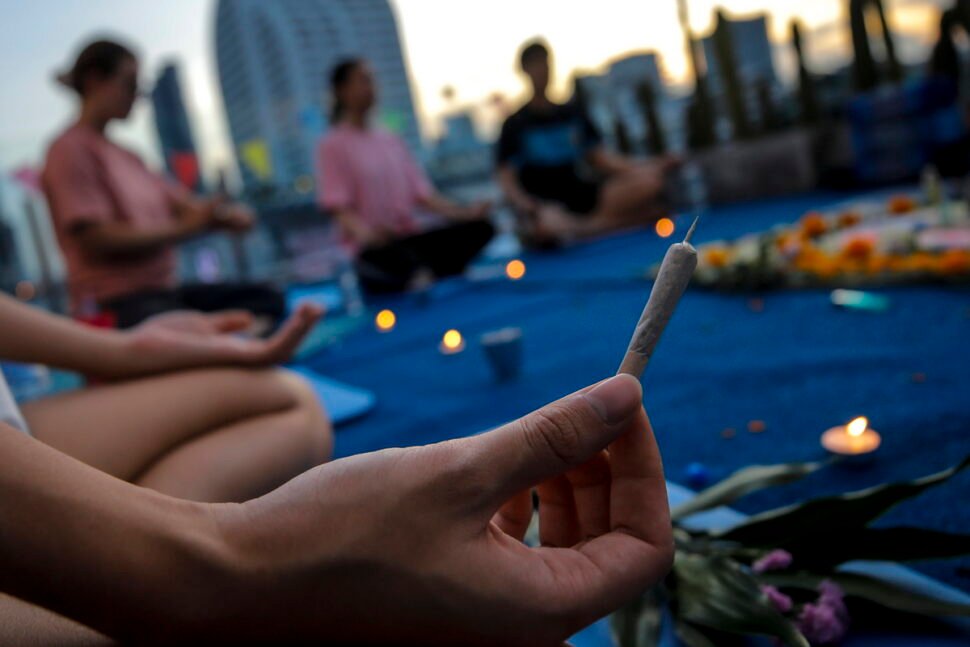 cannabis dispensary in bangkok offers a yoga class while smoking marijuana