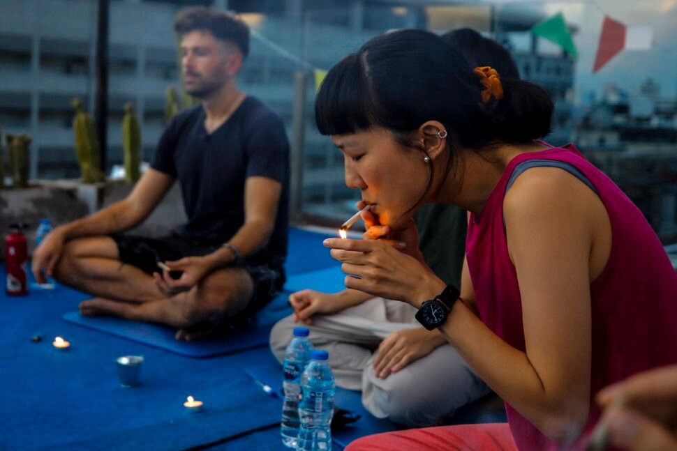 cannabis dispensary in bangkok offers a yoga class while smoking marijuana